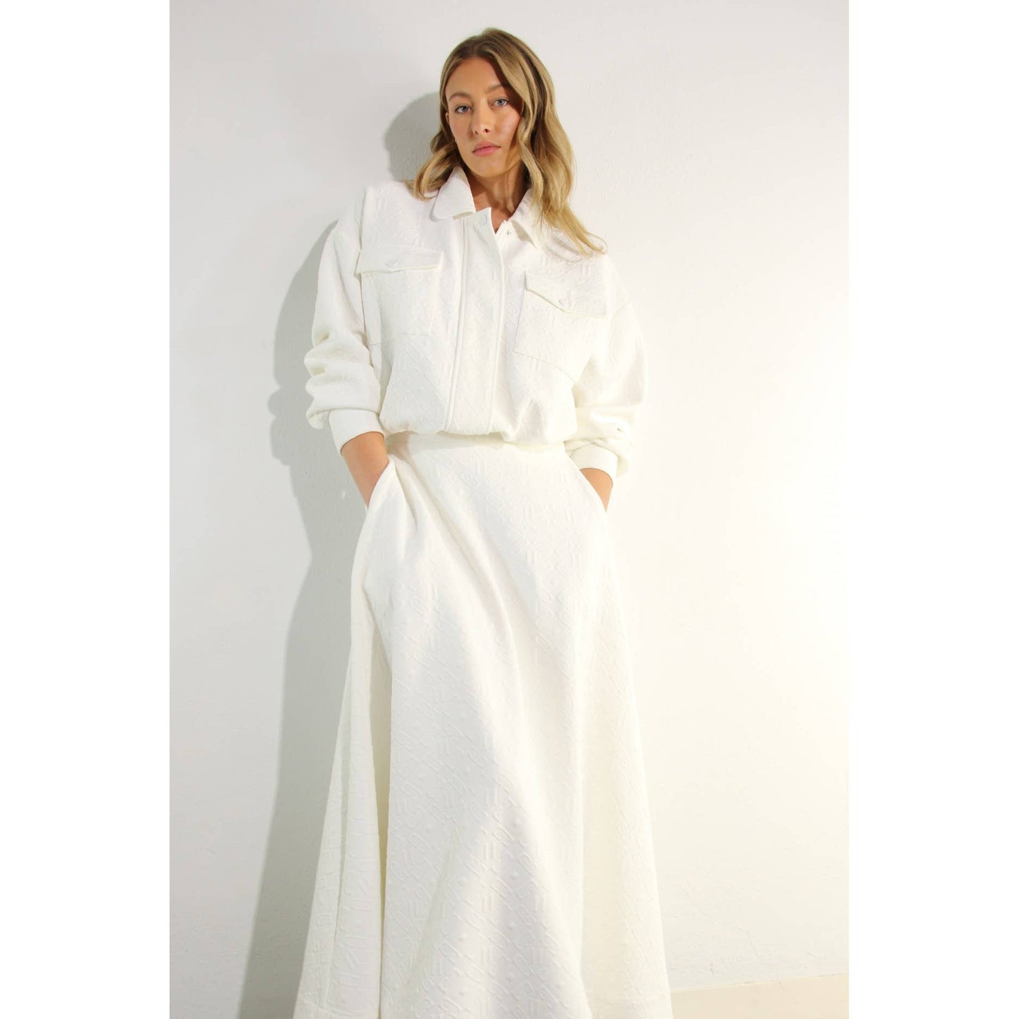EMBOSSED JACKET AND SKIRT SET
