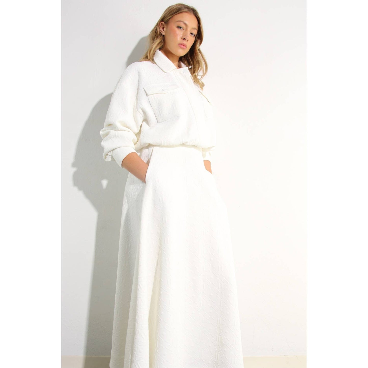 EMBOSSED JACKET AND SKIRT SET