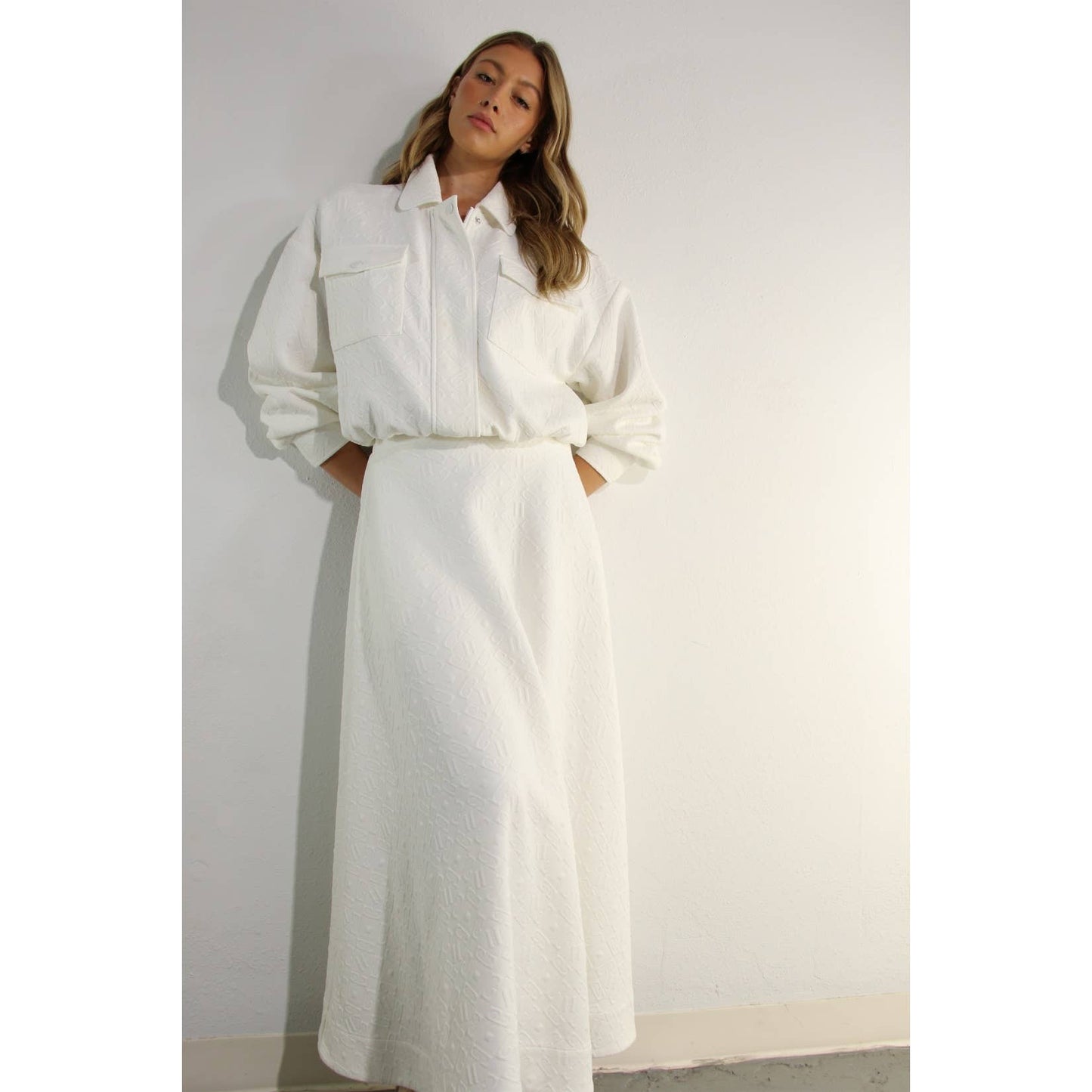 EMBOSSED JACKET AND SKIRT SET